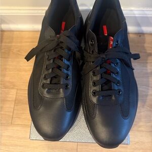 Prada Black Leather & Mesh Men's Lace-Up Sneakers with Red Tongue Accent